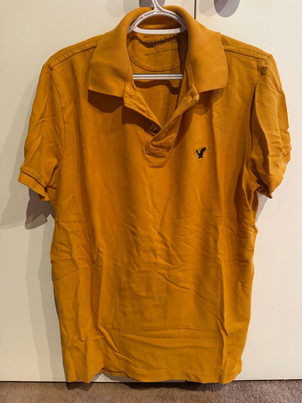 American Eagle Outfitters Men's Mustard Polo with Navy Logo